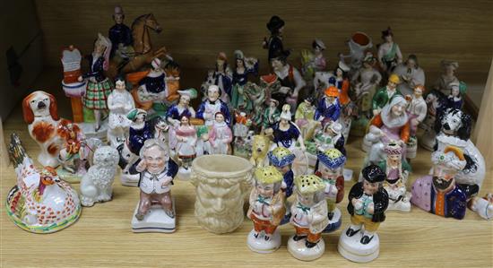 A collection of assorted Staffordshire figures